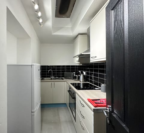 Premium Apartment, Private Bathroom, Garden View (Apartment 2) | Private kitchen | Full-size fridge, microwave, oven, toaster