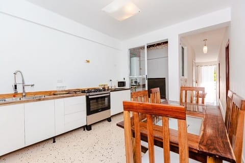 Deluxe Apartment | Private kitchen | Full-size fridge, griddle, cookware/dishes/utensils