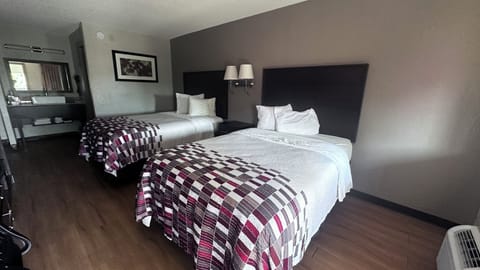 Deluxe Room, 2 Double Beds, Non Smoking | Desk, laptop workspace, blackout drapes, iron/ironing board