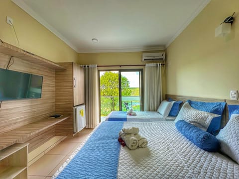 Family Room | Minibar, iron/ironing board, free WiFi, bed sheets