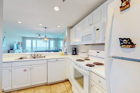 Condo, 2 Bedrooms | Private kitchen | Full-size fridge, microwave, oven, cookware/dishes/utensils