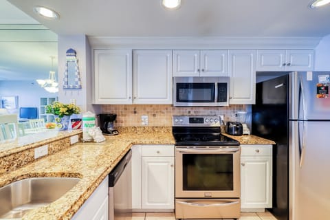 Condo, 2 Bedrooms | Private kitchen | Full-size fridge, microwave, oven, cookware/dishes/utensils