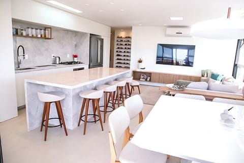 Deluxe Apartment, Pool Access, Sea Facing | Private kitchen | Fridge, microwave, cookware/dishes/utensils, dining tables