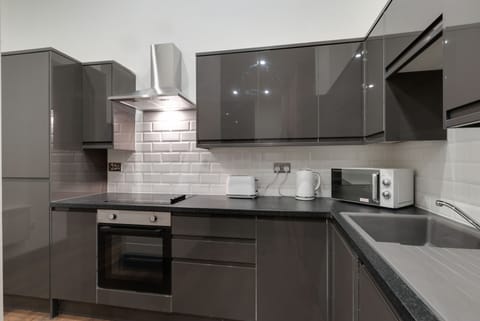 Comfort Apartment | Private kitchen | Full-size fridge, microwave, dishwasher, electric kettle