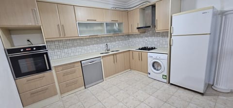 Classic Apartment | Private kitchen | Fridge, stovetop, highchair, cookware/dishes/utensils