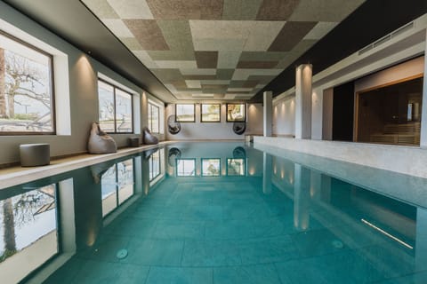 Indoor pool, open 8:00 AM to 9:00 PM, pool umbrellas, sun loungers
