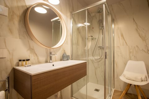 Suite, 1 Bedroom | Bathroom | Shower, rainfall showerhead, free toiletries, hair dryer