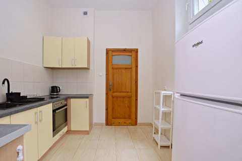 Apartment | Private kitchen | Fridge, oven, stovetop, cookware/dishes/utensils