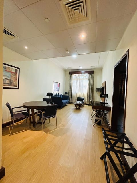 Standard Apartment, 1 Bedroom | Living area | 32-inch flat-screen TV with satellite channels, TV