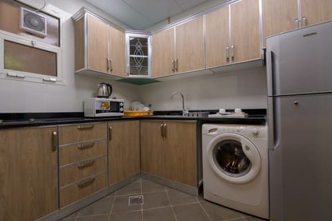 Apartment, 1 Bedroom | Private kitchen | Fridge, microwave, coffee/tea maker, electric kettle