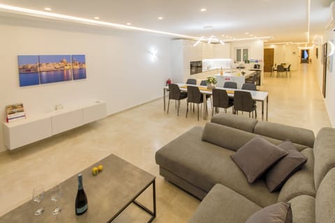 Family Apartment, 3 Bedrooms (Modern & spacious apt 2mn to the sea) | Living room | 21-inch flat-screen TV with cable channels