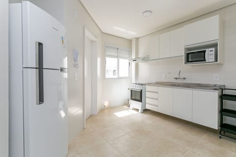 Junior Apartment | Private kitchen | Full-size fridge, microwave, cookware/dishes/utensils, cleaning supplies