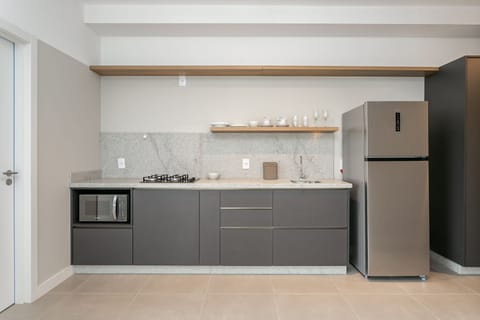 Junior Apartment | Private kitchen | Full-size fridge, microwave, cookware/dishes/utensils, freezer