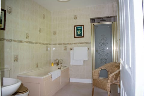 Classic Double Room, Partial Sea View | Bathroom | Separate tub and shower, hair dryer, towels, soap