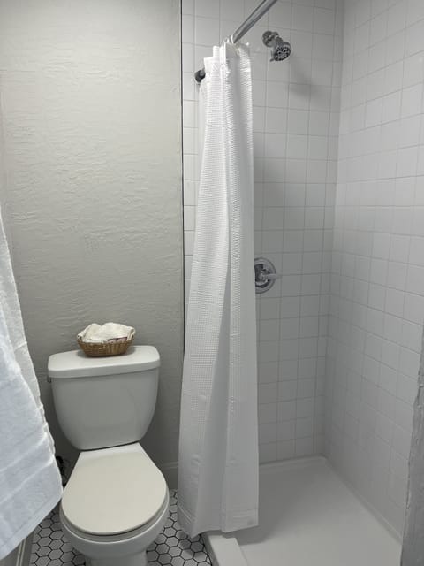 Room, Multiple Beds | Bathroom | Separate tub and shower, towels, toilet paper