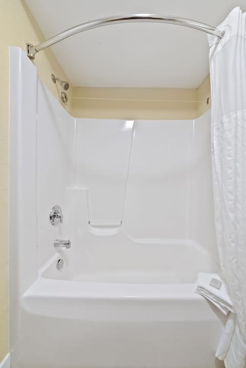 Standard Suite, 1 King Bed with Sofa bed | Bathroom | Combined shower/tub, hair dryer, towels, soap