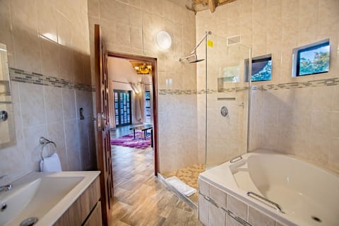 Separate tub and shower, hair dryer, bathrobes, towels