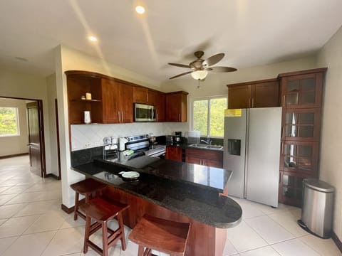 Condo, 2 Bedrooms | Private kitchen | Fridge, oven, coffee/tea maker, toaster