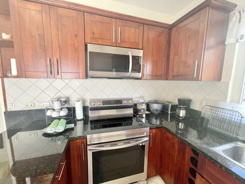 Condo, 2 Bedrooms | Private kitchen | Fridge, oven, coffee/tea maker, toaster