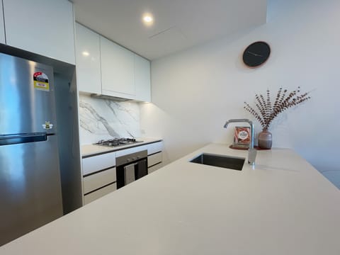 Apartment | Private kitchen | Full-size fridge, microwave, oven, stovetop