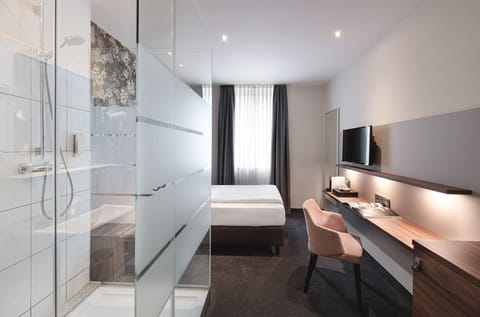 Standard Single Room | Living area | Flat-screen TV