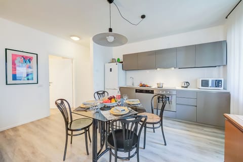 Family Apartment, 1 Bedroom, Refrigerator & Microwave (Domus Raffaella) | Private kitchen | Fridge, microwave, oven, stovetop