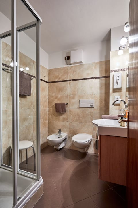 Standard Double Room | Bathroom | Shower, free toiletries, hair dryer, slippers