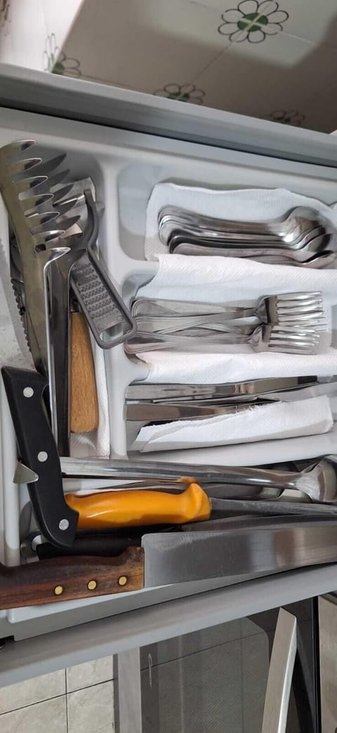 Full-size fridge, microwave, oven, cookware/dishes/utensils