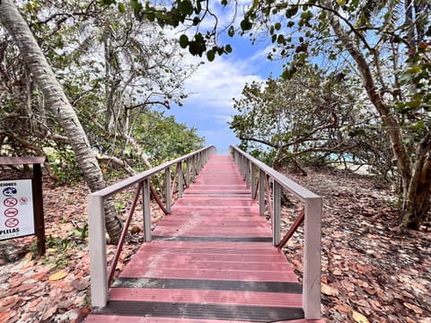 Beach nearby, white sand, beach towels