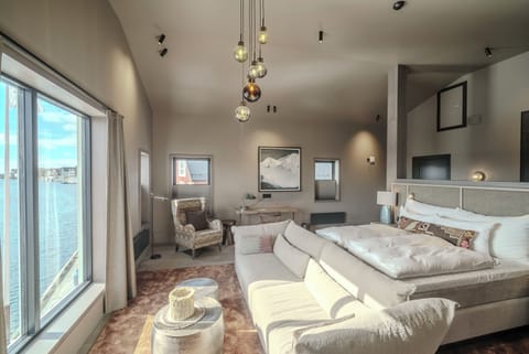 Loft suite with Harbour view | Premium bedding, down comforters, minibar, desk