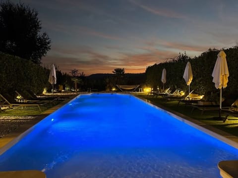 Seasonal outdoor pool, pool umbrellas, sun loungers