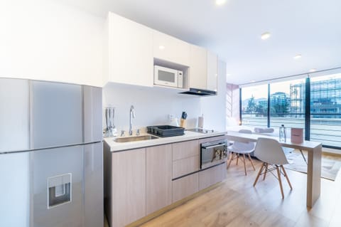 Apartment (502) | Private kitchen | Oven, electric kettle, toaster