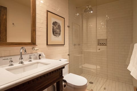 Classic Suite | Bathroom | Designer toiletries, hair dryer, bathrobes, slippers