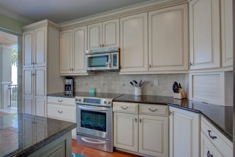 House, Multiple Beds (Anna Maria Island Beach Palace) | Private kitchen | Highchair