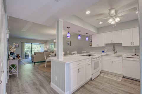 Condo, 1 King Bed with Sofa bed (Anna Maria Island Runaway Tropical Es) | Private kitchen | Highchair