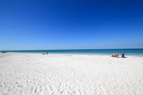 Condo, 1 King Bed with Sofa bed (Anna Maria Island Runaway Tropical Es) | Beach | Private beach, white sand