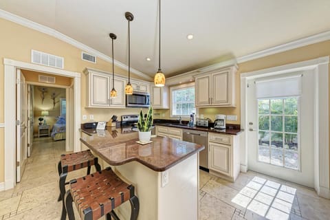 House, Multiple Beds, Pool View (Anna Maria Island Edgewater Bungalow) | Private kitchen | Highchair