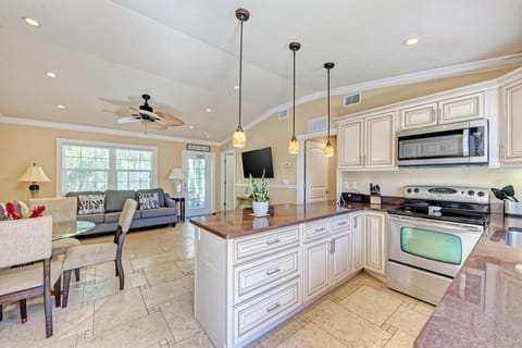 House, Multiple Beds, Pool View (Anna Maria Island Edgewater Bungalow) | Private kitchen | Highchair