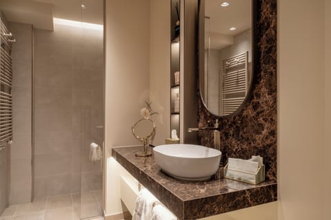 Shower, free toiletries, hair dryer, bathrobes