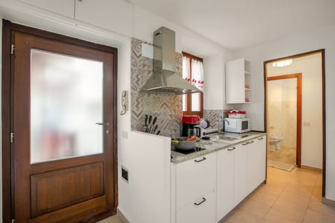 Standard Apartment, 1 Bedroom (Lami Apartment Intra Center) | Private kitchen | Microwave, stovetop, cookware/dishes/utensils