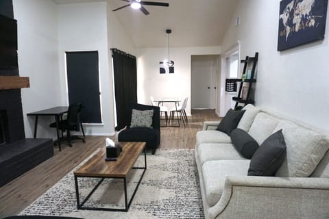 Family Townhome | Living area | 55-inch Smart TV with digital channels, Netflix, streaming services