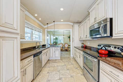 House, Multiple Beds, Pool View (Anna Maria Island Surfside Bungalow) | Private kitchen | Highchair