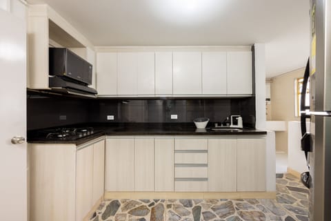 Family Apartment | Private kitchen | Full-size fridge, microwave, stovetop, coffee/tea maker