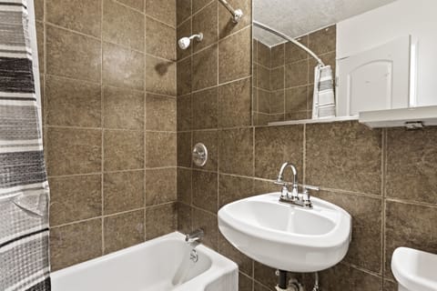 Superior Studio Suite | Bathroom | Hair dryer, towels, soap, shampoo