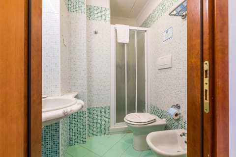 Comfort Quadruple Room, Partial Sea View | Bathroom | Shower, hair dryer, towels, soap