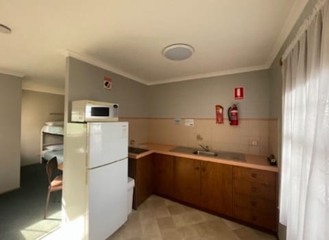 Family Apartment | Private kitchen | Full-size fridge, highchair, cookware/dishes/utensils