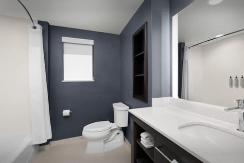 Hair dryer, towels, soap, shampoo