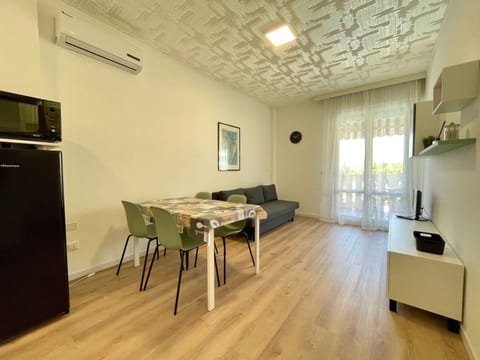 Apartment, 1 Bedroom, Balcony, Pool View | Living area