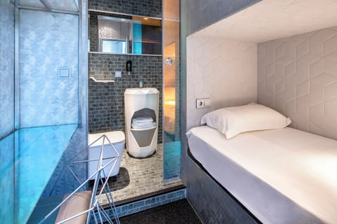 Single Lower capsule with Shower No Window | Individually decorated, desk, laptop workspace, free WiFi