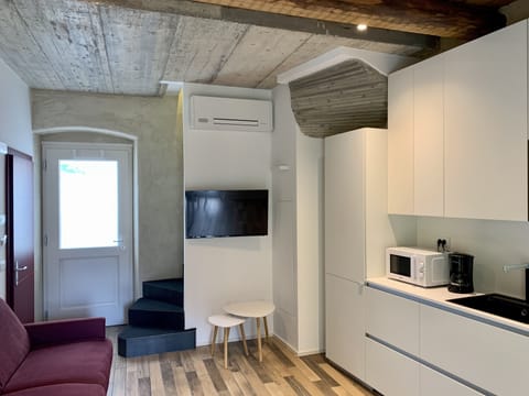 Duplex | Living area | 27-inch LED TV with satellite channels